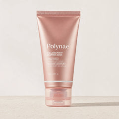 Polynae Collagen Night Wrapping Mask tube standing upright on a light stone surface against a neutral background