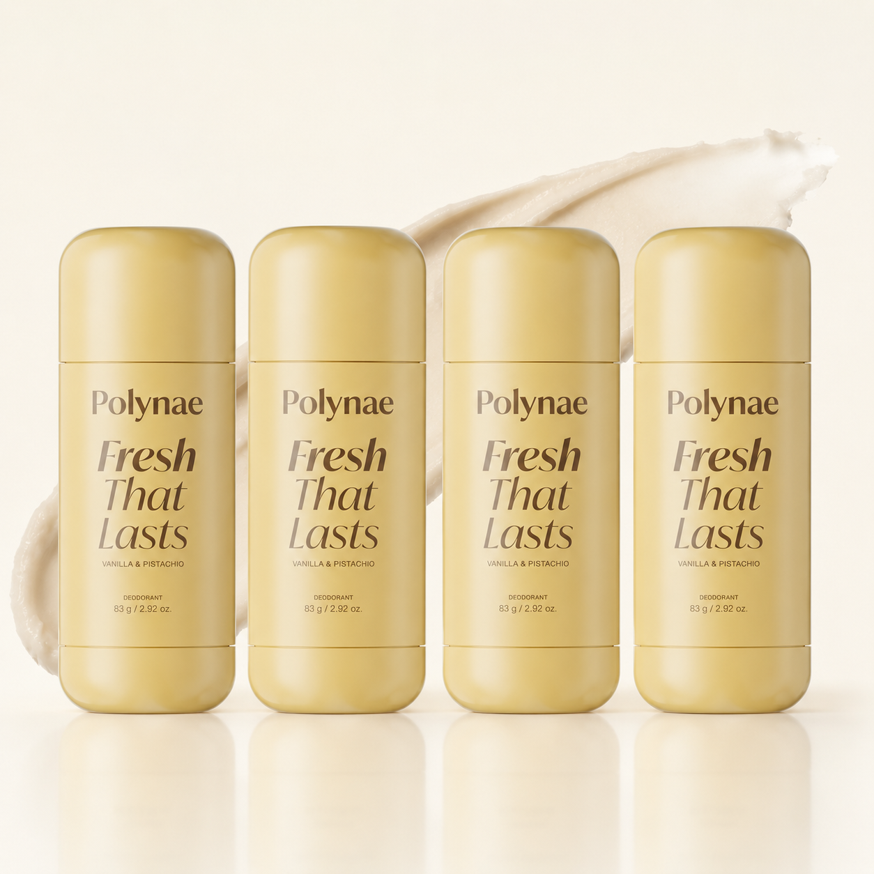 Four Polynae “Fresh That Lasts” Vanilla & Pistachio deodorant sticks arranged in a row on a light cream background, with a soft cosmetic smear and gentle reflection for a clean product-display look.