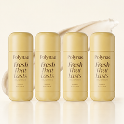 Four Polynae “Fresh That Lasts” Vanilla & Pistachio deodorant sticks arranged in a row on a light cream background, with a soft cosmetic smear and gentle reflection for a clean product-display look.
