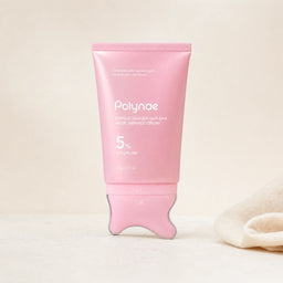 Polynae PDRN Collagen Gua Sha Neck Wrinkle Cream pink tube standing upright on a gua sha applicator base against a neutral beige background