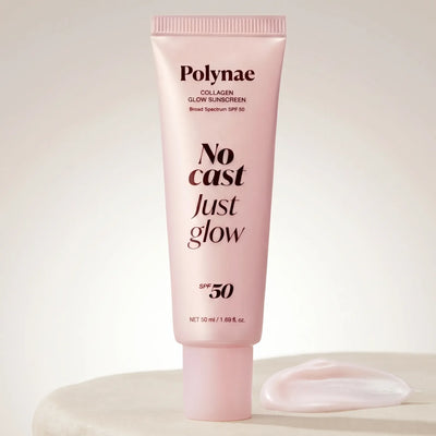 Polynae Collagen Glow Sunscreen tube in pale pink standing upright on a white surface with a cream swatch beside it