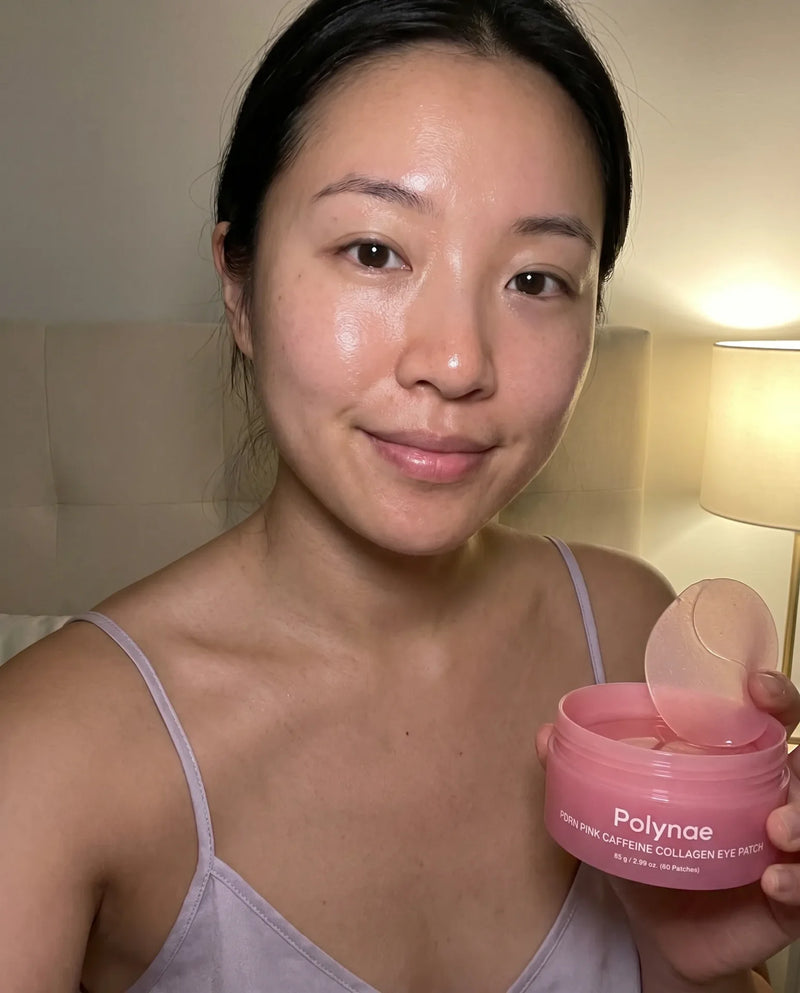 Customer holding open pink jar of Polynae PDRN Pink Caffeine Collagen Eye Patch, showing gel patches inside, fresh dewy skin visible